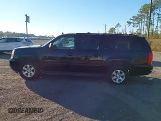 2012 GMC Yukon XL SLT with VIN 1GKS2KE71CR161613, listed as a IAAI auction lot 41021605 with 236,272 mi miles. Bid and sale history available at carsss.com. Image 14.