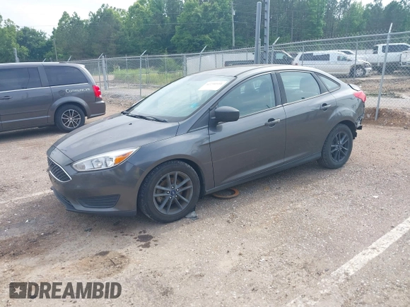 2018 Ford Focus SE with VIN 1FADP3F29JL288761, listed as a IAAI auction lot 42290510 with 93,463 mi miles and . Bid and sale history available at DreamBid. Image 2.