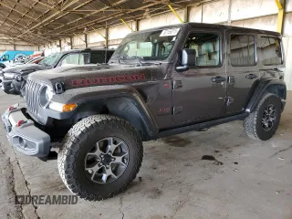 2019 Jeep Wrangler Unlimited Rubicon with VIN 1C4HJXFG1KW610292, listed as a Copart auction lot 52156815 with 78,017 mi miles and Salvage title. Bid and sale history available at DreamBid. Image 1.
