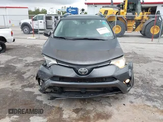 2017 Toyota RAV4 XLE with VIN JTMWFREVXHD096998, listed as a IAAI auction lot 41997925 with 119,564 mi miles and . Bid and sale history available at DreamBid. Image 6.
