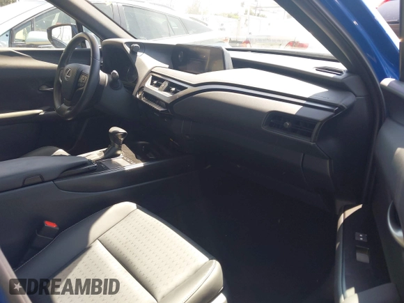 2022 Lexus UX with VIN JTHX3JBH0N2049742, listed as a IAAI auction lot 41917341 with 18,728 mi miles. Bid and sale history available at carsss.com. Image 5.