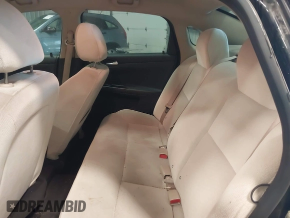 2013 Chevrolet Impala LS with VIN 2G1WF5E38D1130975, listed as a IAAI auction lot 41260029 with 64,068 mi miles and . Bid and sale history available at DreamBid. Image 8.