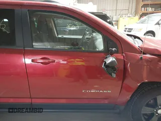 2014 Jeep Compass Sport with VIN 1C4NJDBB2ED684042, listed as a IAAI auction lot 41966076 with 136,773 mi miles. Bid and sale history available at carsss.com. Image 13.