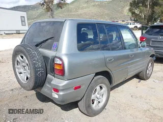 1999 Toyota RAV4 with VIN JT3GP10V5X7042178, listed as a IAAI auction lot 41939833 with 161,818 mi miles and . Bid and sale history available at DreamBid. Image 4.
