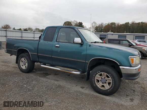 1997 Toyota T100 SR5 with VIN JT4UN24DXV0048933, listed as a Copart auction lot 79479214 with 311,763 mi miles and Clean Title. Bid and sale history available at DreamBid. Image 4.