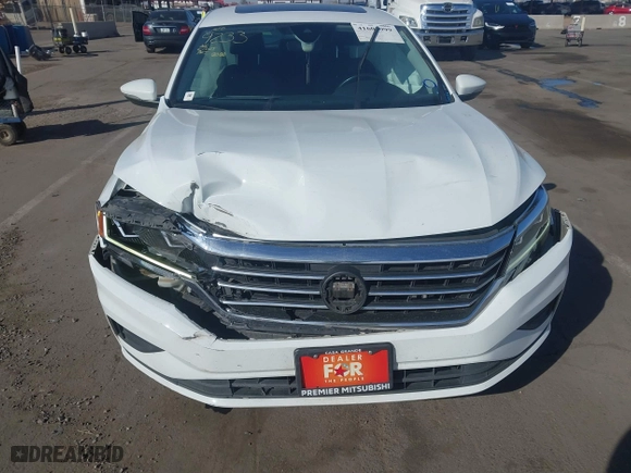 2021 Volkswagen Passat 2.0T SE with VIN 1VWSA7A32MC001319, listed as a IAAI auction lot 41603999 with 113,016 mi miles. Bid and sale history available at carsss.com. Image 6.