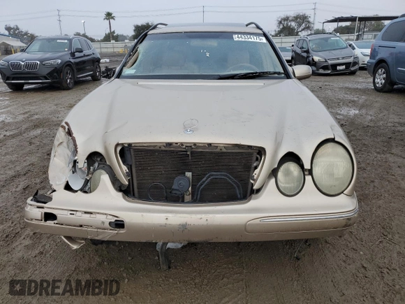 2001 Mercedes-Benz E-Class with VIN WDBJH65J71B230219, listed as a Copart auction lot 44334175 with 147,331 mi miles and Salvage Title. Bid and sale history available at carsss.com. Image 5.