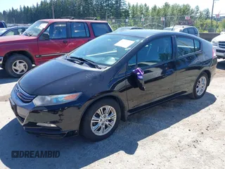 2010 Honda Insight EX with VIN JHMZE2H76AS043235, listed as a IAAI auction lot 42715178 with 156,073 mi miles and . Bid and sale history available at DreamBid. Image 2.