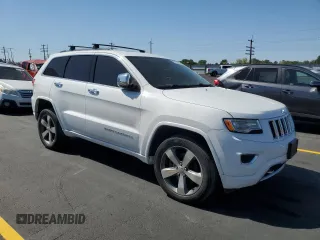 2015 Jeep Grand Cherokee Overland with VIN 1C4RJFCM4FC618516, listed as a Copart auction lot 58671455 with 221,550 mi miles and Clean title. Bid and sale history available at DreamBid. Image 4.