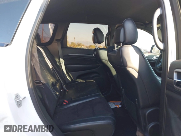 2020 Jeep Grand Cherokee Altitude with VIN 1C4RJEAG1LC251934, listed as a IAAI auction lot 41480299 with 74,169 mi miles and . Bid and sale history available at DreamBid. Image 8.