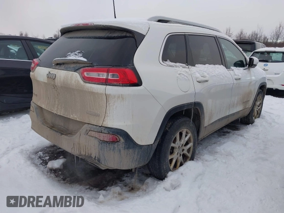 2016 Jeep Cherokee Latitude with VIN 1C4PJMCS0GW193936, listed as a IAAI auction lot 41440254 with 156,477 mi miles. Bid and sale history available at carsss.com. Image 4.