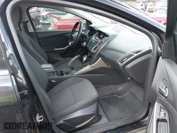 2012 Ford Focus SEL with VIN 1FAHP3M2XCL106248, listed as a IAAI auction lot 42088933 with 117,333 mi miles. Bid and sale history available at carsss.com. Image 5.