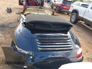 2007 Porsche 911 Carrera S z VIN WP0CB29967S775552, wystawiony jako IAAI lot #42218602 z przebiegiem 81 015 mil mil oraz . Historia ofert i sprzedaży dostępna na DreamBid. Obrazek 16.