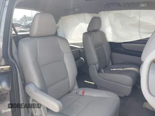 2014 Honda Odyssey EX-L with VIN 5FNRL5H60EB117218, listed as a IAAI auction lot 42201739 with 184,586 mi miles and . Bid and sale history available at DreamBid. Image 8.