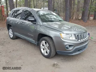 2011 Jeep Compass Latitude with VIN 1J4NF1FB5BD264825, listed as a IAAI auction lot 41935691 with 166,184 mi miles. Bid and sale history available at carsss.com. Image 1.