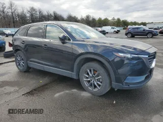 2022 Mazda CX-9 Touring with VIN JM3TCBCY0N0609332, listed as a Copart auction lot 51082965 with 54,172 mi miles and Salvage title. Bid and sale history available at DreamBid. Image 4.