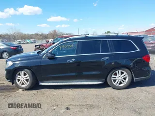 2014 Mercedes-Benz GL-Class GL 450 with VIN 4JGDF7CEXEA277610, listed as a IAAI auction lot 41909424 with 164,437 mi miles. Bid and sale history available at carsss.com. Image 14.
