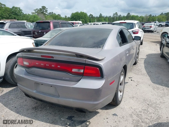 2013 Dodge Charger SE with VIN 2C3CDXBG3DH655523, listed as a IAAI auction lot 42003869 with 172,948 mi miles. Bid and sale history available at carsss.com. Image 4.