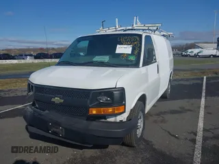 2015 Chevrolet Express Cargo with VIN 1GCWGFCF1F1161498, listed as a IAAI auction lot 41878871 with 157,365 mi miles. Bid and sale history available at carsss.com. Image 2.
