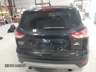 2015 Ford Escape SE with VIN 1FMCU9G97FUA21287, listed as a IAAI auction lot 41990144 with 55,036 mi miles and . Bid and sale history available at DreamBid. Image 17.