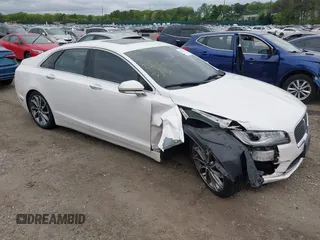 2019 Lincoln MKZ Reserve I z VIN 3LN6L5D91KR606901, wystawiony jako IAAI lot #42301754 z przebiegiem 86 587 mil mil oraz . Historia ofert i sprzedaży dostępna na DreamBid. Obrazek 1.