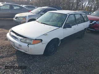 1997 Ford Escort LX with VIN 3FALP15P1VR124828, listed as a IAAI auction lot 42128530 with Not Provided miles and . Bid and sale history available at DreamBid. Image 2.