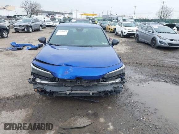 2023 Honda Civic Sport z VIN 2HGFE2F56PH502559, wystawiony jako IAAI lot #41558054 z przebiegiem 48 961 mil mil oraz . Historia ofert i sprzedaży dostępna na DreamBid. Obrazek 12.