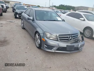 2014 Mercedes-Benz C 250 Sport with VIN WDDGF4HB7EG257087, listed as a IAAI auction lot 42169917 with 165,278 mi miles and . Bid and sale history available at DreamBid. Image 1.