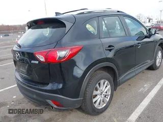2016 Mazda CX-5 Sport with VIN JM3KE4BY7G0893578, listed as a IAAI auction lot 41853840 with 95,937 mi miles. Bid and sale history available at carsss.com. Image 4.