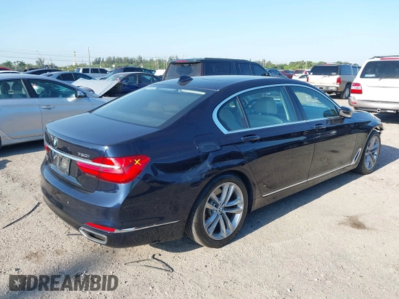 2018 BMW 7 Series ALPINA B7 xDrive with VIN WBA7F2C59JG424704, listed as a IAAI auction lot 42070608 with 56,690 mi miles and . Bid and sale history available at carsss.com. Image 4.