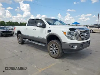 2016 Nissan Titan Platinum Reserve with VIN 1N6BA1F48GN515859, listed as a Copart auction lot 61955385 with 80,858 mi miles and Clean title. Bid and sale history available at DreamBid. Image 4.