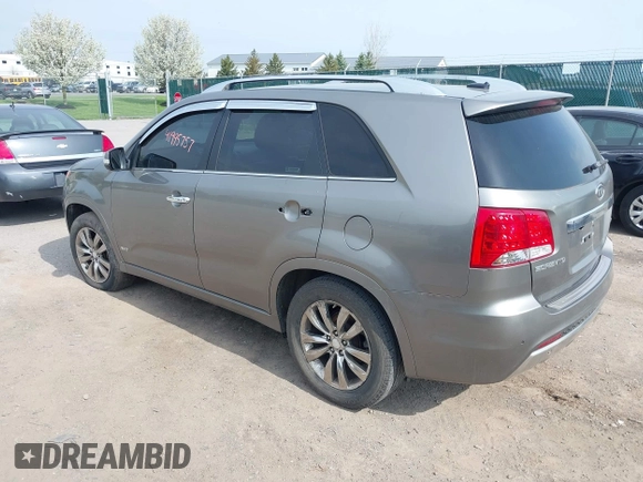 2013 Kia Sorento SX with VIN 5XYKWDA23DG415747, listed as a IAAI auction lot 41995757 with 165,894 mi miles. Bid and sale history available at carsss.com. Image 3.