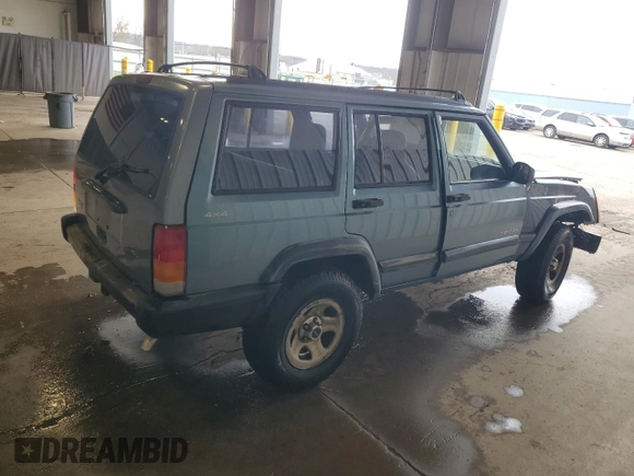 1998 Jeep Cherokee Sport with VIN 1J4FJ68S0WL152197, listed as a Copart auction lot 52512605 with Not provided miles and Salvage title. Bid and sale history available at DreamBid. Image 3.
