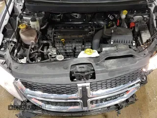 2018 Dodge Journey SE с VIN 3C4PDCAB0JT527478, выставлен на аукционе Copart как лот 51521555 с пробегом 102 857 миль миль и Списание • Salvage title. История ставок и продаж доступна на DreamBid. Изображение 15.