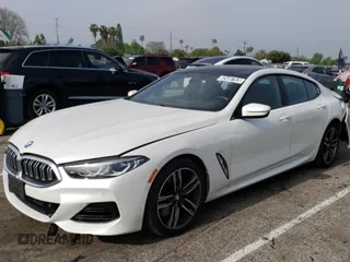 2023 BMW 8 Series 840i with VIN WBAGV4C04PCK51113, listed as a Copart auction lot 52495763 with 17,688 mi miles. Bid and sale history available at carsss.com. Image 1.