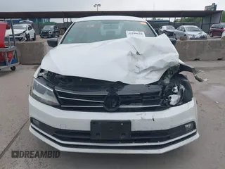 2016 Volkswagen Jetta Sport z VIN 3VWD17AJ1GM334234, wystawiony jako IAAI lot #42299618 z przebiegiem 86 143 mil mil oraz . Historia ofert i sprzedaży dostępna na DreamBid. Obrazek 12.