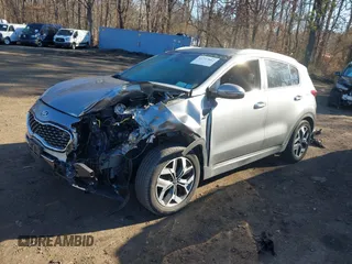 2021 Kia Sportage EX with VIN KNDPNCAC8M7854533, listed as a IAAI auction lot 41757662 with 25,051 mi miles and . Bid and sale history available at DreamBid. Image 2.