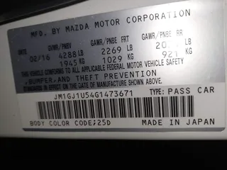 2016 Mazda Mazda6 i Sport with VIN JM1GJ1U54G1473671, listed as a IAAI auction lot 41576038 with 88,386 mi miles. Bid and sale history available at carsss.com. Image 9.