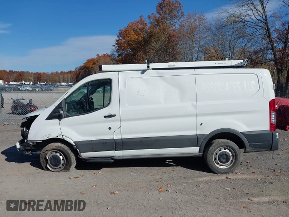 2023 Ford Transit Cargo with VIN 1FTBR1Y86PKA79798, listed as a IAAI auction lot 40155361 with 28,670 mi miles and . Bid and sale history available at DreamBid. Image 13.