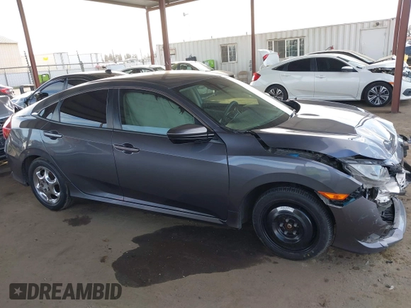 2020 Honda Civic Sedan LX with VIN 2HGFC2F61LH552858, listed as a IAAI auction lot 41554396 with 166,982 mi miles. Bid and sale history available at carsss.com. Image 14.