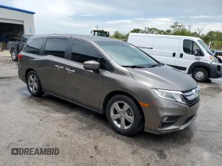 2018 Honda Odyssey EX with VIN 5FNRL6H5XJB017330, listed as a Copart auction lot 63470395 with 121,827 mi miles and Salvage title. Bid and sale history available at DreamBid. Image 4.