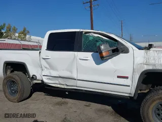 2016 GMC Sierra 1500 SLT with VIN 3GTU2NEC2GG244329, listed as a IAAI auction lot 40810002 with 121,716 mi miles. Bid and sale history available at carsss.com. Image 17.