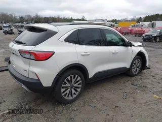2020 Ford Escape Titanium Hybrid with VIN 1FMCU9DZ0LUC56274, listed as a IAAI auction lot 41256530 with 43,502 mi miles and . Bid and sale history available at DreamBid. Image 4.