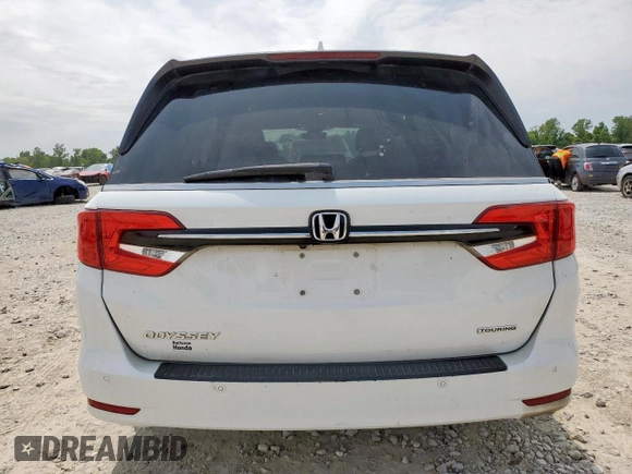 2023 Honda Odyssey Touring с VIN 5FNRL6H8XPB001311, выставлен на аукционе Copart как лот 56924345 с пробегом 77 736 миль миль и Списание • Salvage title. История ставок и продаж доступна на DreamBid. Изображение 6.