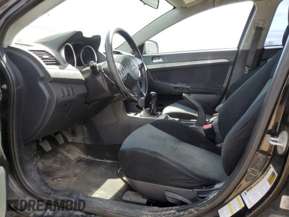 2009 Mitsubishi Lancer z VIN JA3AX88W99U613116, wystawiony jako Copart lot #58765855 z przebiegiem 256 289 mil mil oraz Czysty tytuł • Clean title. Historia ofert i sprzedaży dostępna na DreamBid. Obrazek 7.