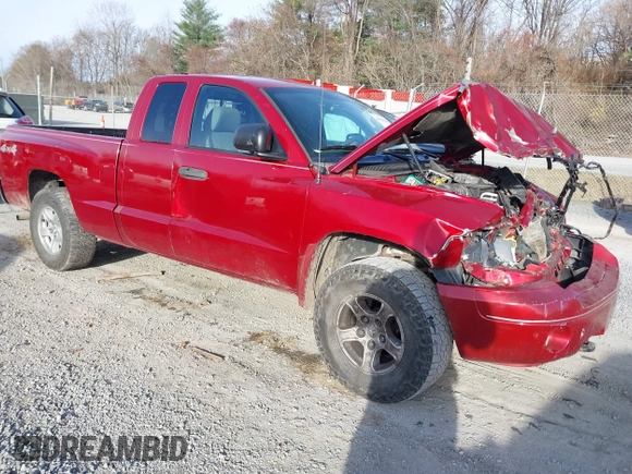 2006 Dodge Dakota SLT with VIN 1D7HW42N16S525329, listed as a IAAI auction lot 40920101 with 124,535 mi miles and . Bid and sale history available at carsss.com. Image 1.