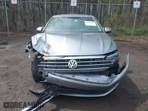 2021 Volkswagen Jetta S z VIN 3VWC57BUXMM048600, wystawiony jako IAAI lot #41956222 z przebiegiem 59 870 mil mil oraz . Historia ofert i sprzedaży dostępna na DreamBid. Obrazek 12.