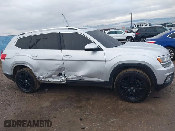 2018 Volkswagen Atlas SEL Premium with VIN 1V2NR2CA8JC575425, listed as a IAAI auction lot 41104744 with 62,774 mi miles and . Bid and sale history available at DreamBid. Image 14.