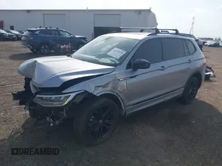 2022 Volkswagen Tiguan SE R-Line Black with VIN 3VV8B7AX7NM030703, listed as a IAAI auction lot 42135974 with 57,116 mi miles and . Bid and sale history available at DreamBid. Image 18.