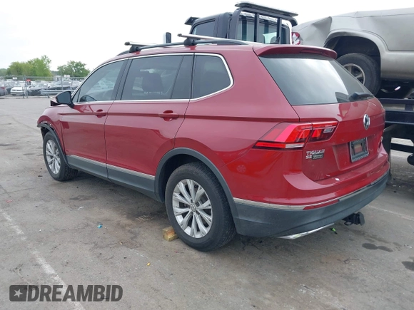 2018 Volkswagen Tiguan SEL with VIN 3VV3B7AXXJM086672, listed as a IAAI auction lot 42006533 with 90,511 mi miles and . Bid and sale history available at DreamBid. Image 3.
